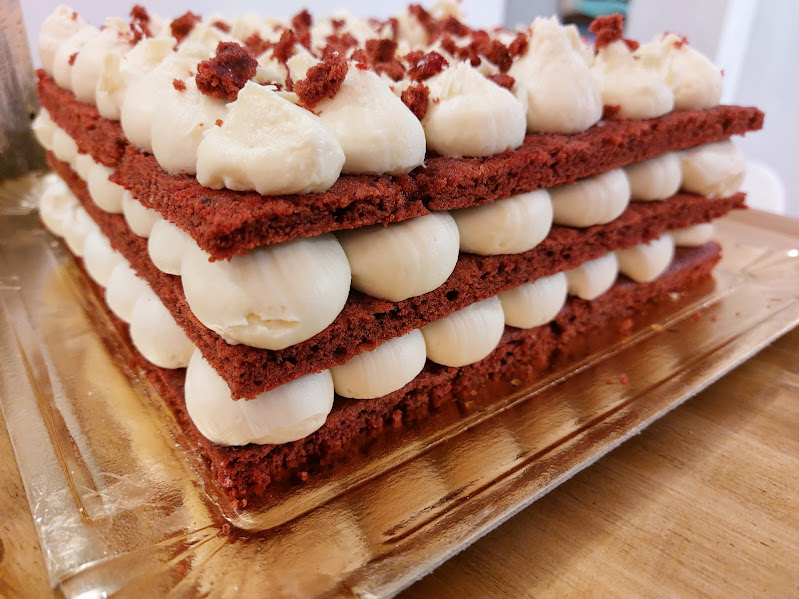 Layered red velvet cake with cream
