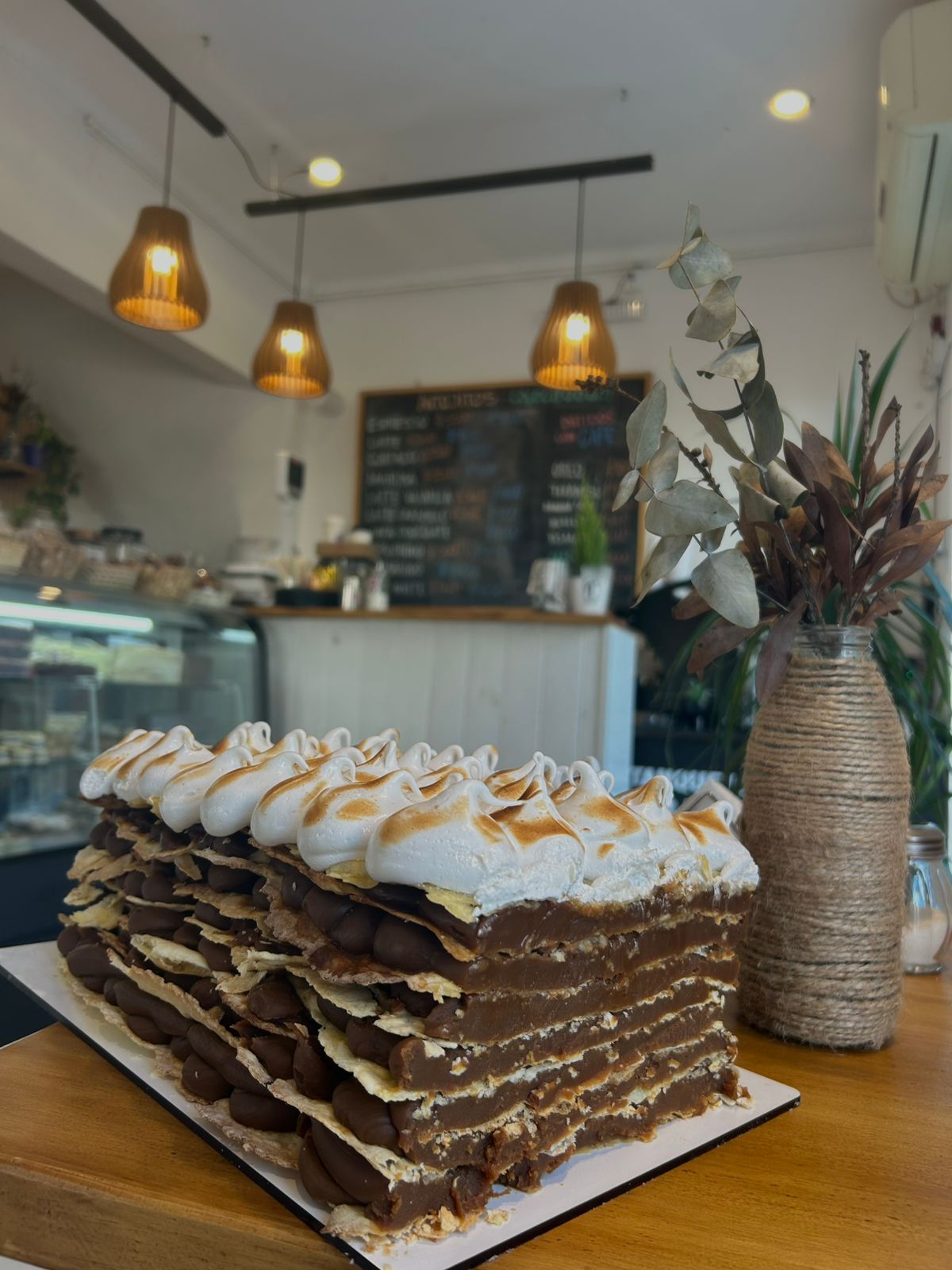 Rogel layered cake with dulce de leche and meringue, inside the shop